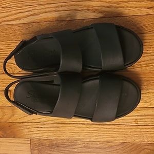 Black pair of Skechers Luxe Form Sandals